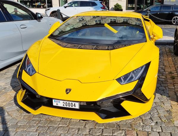 Dubai, UAE seen in Prague, Czech Republic. Photo taken on 05.07.2025. My first ever picture of UAE license plate. Even 2 of them next to each other. One on Lamborghini, second on Ferrari.