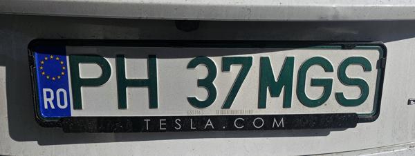 Prahova County, Romania spotted in Prague, Czech Republic. Photo taken on 11.04.2026. Green font for electric vehicles. Close-up photo of the rear plate.